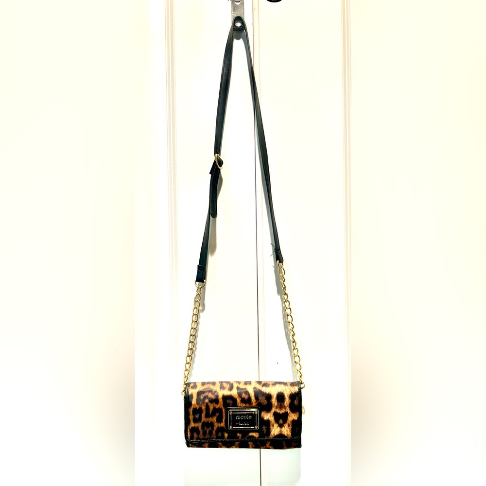 Nicole Miller clutch crossbody leopard print purse. Never used. Like New. Satin